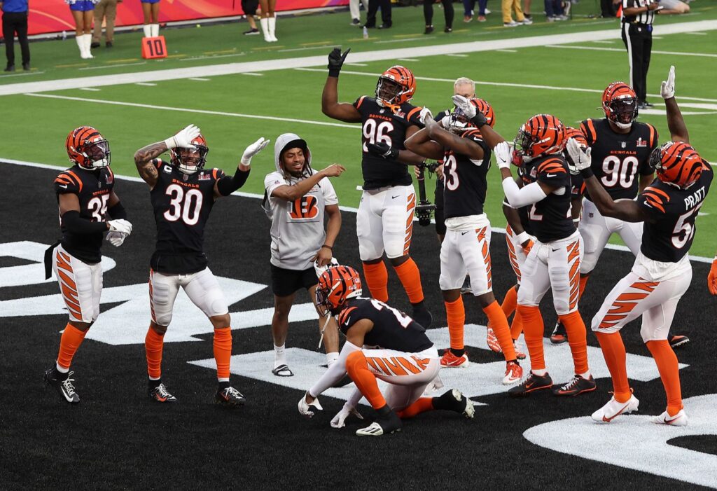 Bengals teammates celebrating a interception by Jessie Bates III. injured cornerback Vernon Hargreaves also among the celebraters. Rob Carr Getty Images