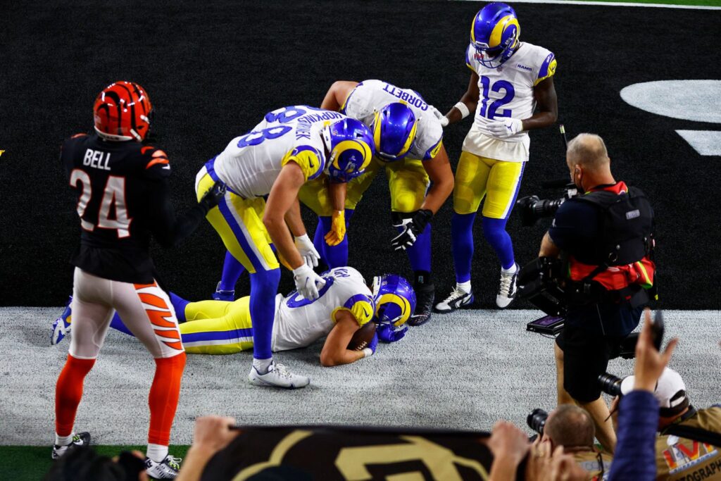 Teammates surrounded Kupp after he took the catch. The touchdown got overturned with a penalty, but kupp caught again. Ronald Martinez Getty Images