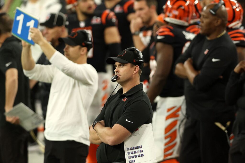 Zac Taylor, the Bengals head coach watcheing from the sideline of stadium. Rob Carr Getty Images